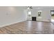 Living room with fireplace, hardwood floors, and large windows at 5344 Salem Woods Dr # 20, Graham, NC 27253