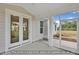 Covered porch with views of the backyard at 5344 Salem Woods Dr # 20, Graham, NC 27253