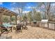 This patio boasts an outdoor kitchen with a built-in grill and a playset for  at 601 Ballad Creek Ct, Cary, NC 27519