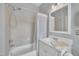 Bright bathroom with tub and shower combination and vanity at 601 Ballad Creek Ct, Cary, NC 27519