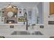 Gourmet kitchen featuring stainless steel appliances, a sink, and stone countertops at 601 Ballad Creek Ct, Cary, NC 27519