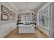 Spacious office featuring custom built-ins, hardwood floors, and plenty of natural light at 601 Ballad Creek Ct, Cary, NC 27519