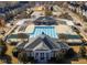 Stunning aerial view of the community pool and clubhouse, perfect for relaxation and recreation at 601 Ballad Creek Ct, Cary, NC 27519