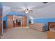 Spacious bonus room with carpet, vaulted ceilings, and open layout with a comfortable seating area at 651 Sagamore Dr, Louisburg, NC 27549