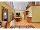 Bright living room with high ceilings, hardwood floors, and view of the lake at 651 Sagamore Dr, Louisburg, NC 27549