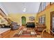 Inviting living room featuring hardwood floors, high ceilings, and comfortable seating at 651 Sagamore Dr, Louisburg, NC 27549