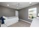 Bedroom featuring a daybed with storage, neutral paint, and lots of natural light at 709 Teal Lake Dr, Holly Springs, NC 27540
