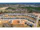 Community aerial showcases the neighborhood layout with new homes, tree line, and street patterns at 74 Silver Moon Ln, Clayton, NC 27527