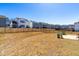 A large, fenced backyard offers ample space for outdoor activities in this lovely property at 74 Silver Moon Ln, Clayton, NC 27527