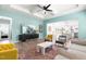 Inviting living room boasts a tray ceiling, hardwood floors, and easy access to the dining area at 74 Silver Moon Ln, Clayton, NC 27527