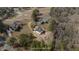Expansive aerial view highlighting the property's location and surrounding greenery at 75 Traceway N, Sanford, NC 27332