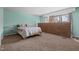 Spacious primary bedroom with a large window for natural light and exposed brick wall at 75 Traceway N, Sanford, NC 27332