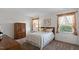 Cozy bedroom featuring natural light, classic furnishings, and an inviting atmosphere for restful nights at 7914 Yester Ct, Raleigh, NC 27615