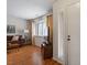 Bright living room featuring hardwood floors, a cozy couch, and lots of natural light at 7914 Yester Ct, Raleigh, NC 27615