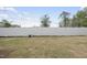 Fenced backyard with grass and in-ground connections at 96 Ripple Way # 316, Clayton, NC 27520
