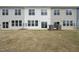 Backyard with grass and AC units at 96 Ripple Way # 316, Clayton, NC 27520