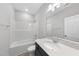 Bathroom featuring large vanity, sleek fixtures, and a shower-tub combo at 96 Ripple Way # 316, Clayton, NC 27520