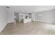 Spacious open-concept living area with lots of light, open to the kitchen and dining areas at 96 Ripple Way # 316, Clayton, NC 27520