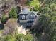 An aerial view of a two-story home with dormer windows and attached two car garage at 1006 Henny Pl, Raleigh, NC 27614