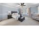 Spacious bedroom with a neutral color palette, plush carpet, and natural light at 1006 Henny Pl, Raleigh, NC 27614