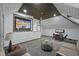 Upstairs bonus room with TV, game table and additional seating, perfect for relaxation and entertainment at 1006 Henny Pl, Raleigh, NC 27614
