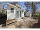 Charming studio exterior with a beautifully landscaped entrance and a cheerful flower boxes at 1006 Henny Pl, Raleigh, NC 27614