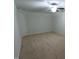 View of a bedroom with neutral carpet and a ceiling fan at 1022 Azimuth Dr, Durham, NC 27713