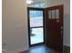 Welcoming entryway with storm door that provides fresh air and additional light at 1022 Azimuth Dr, Durham, NC 27713
