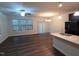 Open layout with hardwood floors, modern appliances, granite counters, and lots of natural light at 1022 Azimuth Dr, Durham, NC 27713