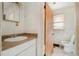 Bathroom featuring a vanity with sink, toilet and natural light at 1066 Shuford Rd, Wake Forest, NC 27587