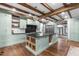 Bright kitchen features a large island with stainless steel appliances at 10726 Trego Trl, Raleigh, NC 27614