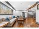 Spacious living room boasts hardwood floors and large windows at 10726 Trego Trl, Raleigh, NC 27614