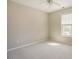 Bright bedroom featuring neutral walls, plush carpet and a ceiling fan at 1104 Mango Crest Dr, Knightdale, NC 27545