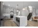 Spacious kitchen featuring a central island, stainless steel appliances, and pendant lighting at 1105 Massey St, Smithfield, NC 27577
