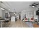 Open-concept living space featuring a modern kitchen, dining area, and cozy seating arrangement at 1105 Massey St, Smithfield, NC 27577