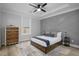 Comfortable bedroom boasts stylish decor, a cozy bed, and soft natural light at 1105 Massey St, Smithfield, NC 27577