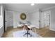 Well-lit home office featuring ample storage, dual chairs, and calming decor at 1105 Massey St, Smithfield, NC 27577
