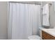 Bathroom featuring a white shower curtain and towel at 1106 Northview St, Garner, NC 27529