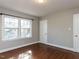 Bedroom showcasing hardwood floors and two windows allowing ample natural light at 1106 Northview St, Garner, NC 27529