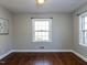 Bedroom with hardwood floors and two windows that offer lots of natural light at 1106 Northview St, Garner, NC 27529