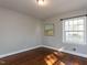 Bedroom featuring hardwood floors, neutral paint, and a window with a view at 1106 Northview St, Garner, NC 27529