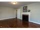 Charming living room features hardwood floors, fireplace, and an open doorway at 1106 Northview St, Garner, NC 27529