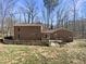 The backyard features a wood deck and a wood fence at 120 Chattleton Ct, Durham, NC 27712