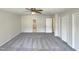 Bedroom featuring neutral carpet with closet storage and natural light at 120 Chattleton Ct, Durham, NC 27712