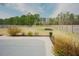 Large fenced backyard offering ample space for recreation, with a well-maintained lawn and landscaping at 129 Edgefield Dr, Sanford, NC 27332