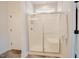 This bathroom features a shower with sliding glass doors and a white tiled surround at 129 Edgefield Dr, Sanford, NC 27332