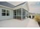 Charming screened porch with outdoor seating, perfect for relaxing and entertaining in a cozy outdoor setting at 129 Edgefield Dr, Sanford, NC 27332