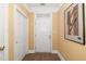 Bright entryway with wood floors, white doors, and decorative wall art at 1331 Langdon Pl, Pittsboro, NC 27312