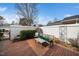 Secluded patio with brick flooring, bench seating and a manicured garden area at 1331 Langdon Pl, Pittsboro, NC 27312