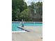 A community pool featuring an ADA lift for accessibility at 160 Kobus Ct, Garner, NC 27529